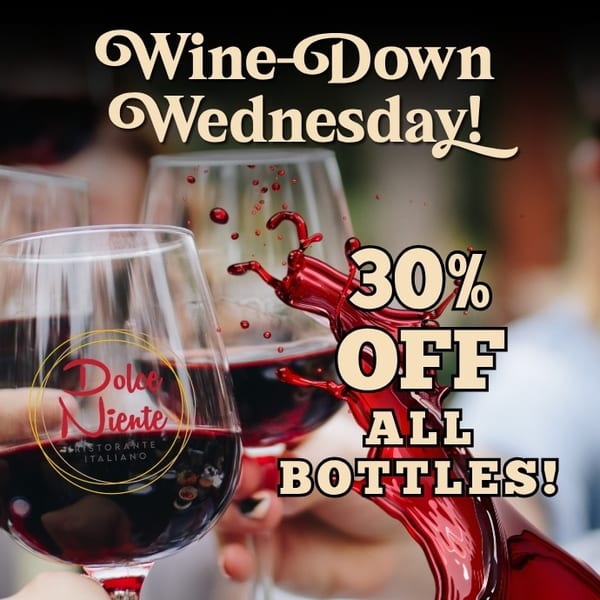 Clinking red wine glasses with a splash, advertising Dolce Niente's "Wine-Down Wednesday" 30% off bottles.